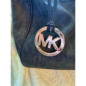 Michael Kors black monogram handbag